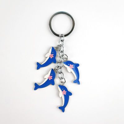 Un porte-clés pour dauphins en alliage de zinc doux émail Un accessoire charmant pour les amateurs d'océan